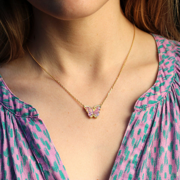 Model wearing One of a kind 18k gold hand carved Wood Opal butterfly pendant with White Diamond pave borders fine jewelry hand made in London. 