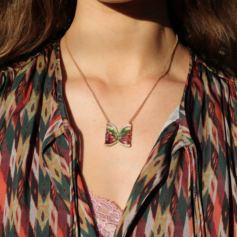 Model wearing 18k gold one of a kind hand carved Tourmaline Butterfly necklace with White Diamond pave, fine jewelry hand made in London from Los Angeles designer Brooke Gregson