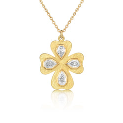 One of a kind, hand engraved 18k gold White Diamond necklace in a floral cross. Fine jewelry hand made in London from Los Angeles designer Brooke Gregson. 