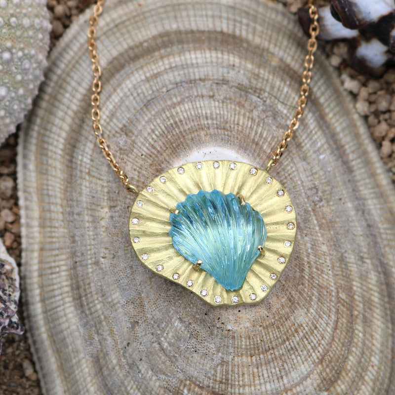 Brooke Gregson 18k gold fine jewellery necklace with carved aquamarine shell and diamond detail hand made in London
