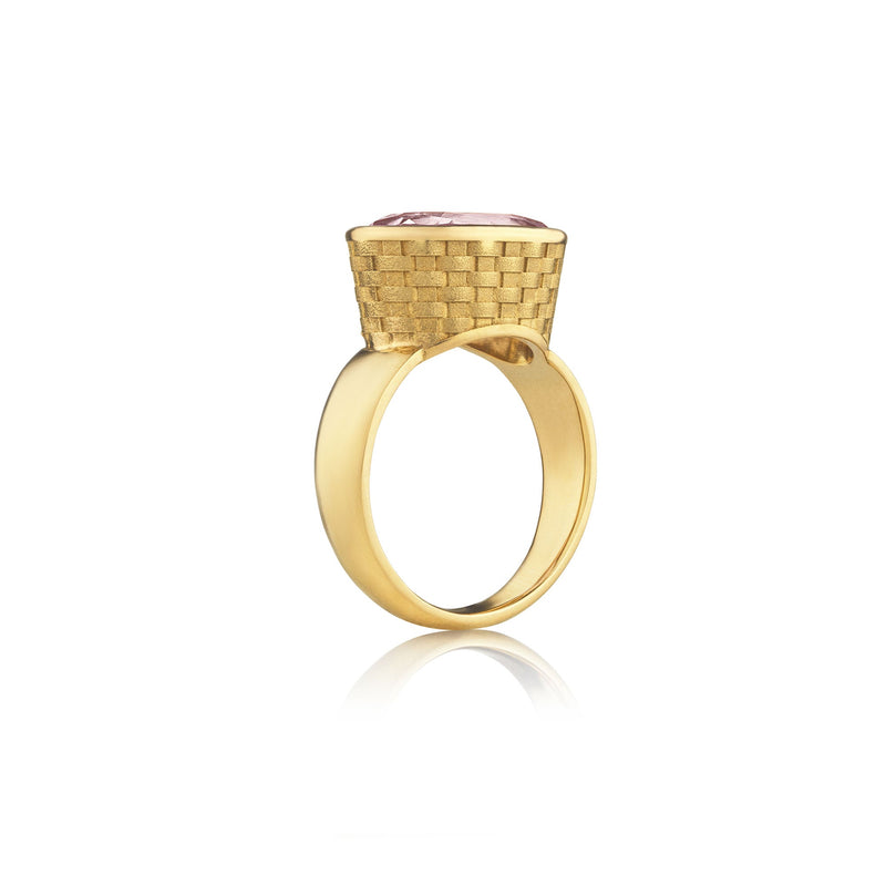 Side view of 18k gold Kunzite ring featuring an engraved basket weave pattern reminiscent of a picnic in springtime. Fine jewelry hand made in London from Los Angeles designer Brooke Gregson.