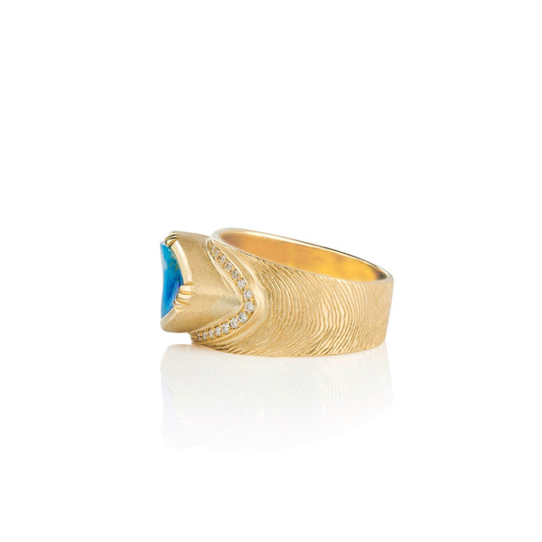 Side view of One of a kind 18k gold Boulder Opal ring with hand engraving and sparkling White Diamond pave. Fine jewelry hand made in London from Los Angeles designer Brooke Gregson.